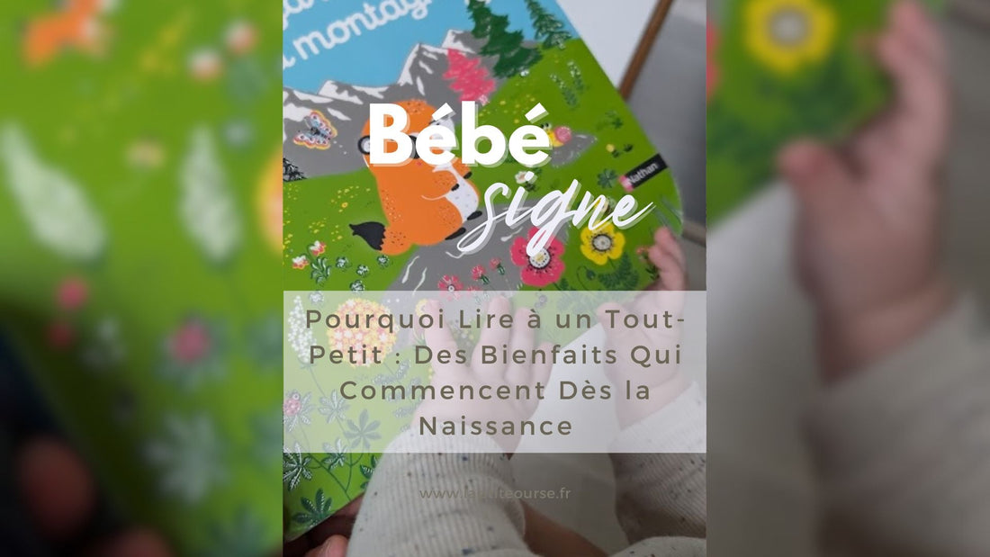Bébé de 7 mois regardant un livre aux illustrations contrastées pendant la lecture