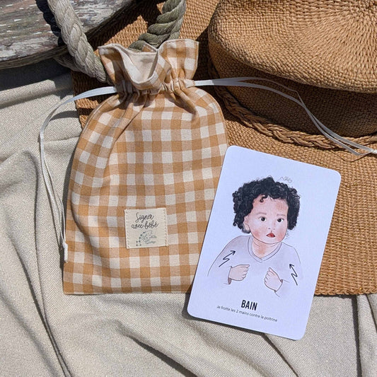 Nouveau pochon miel avec un motif vichy dans les tons bruns dorés accompagnés des cartes signer avec bébé 