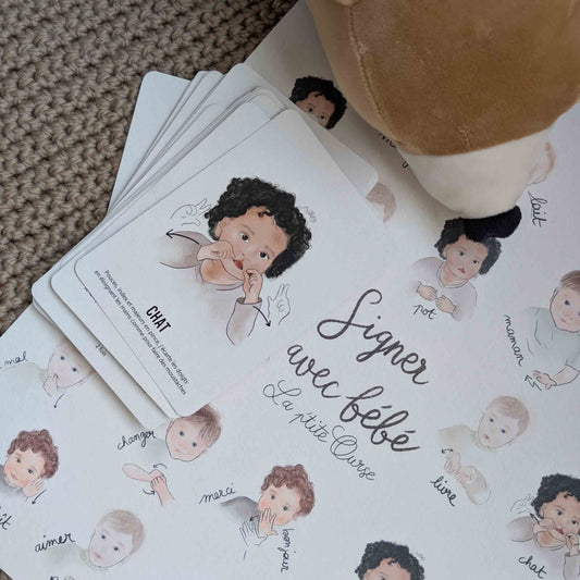 Coffret de carte bébé signe présenté l'affiche signer avec bébé